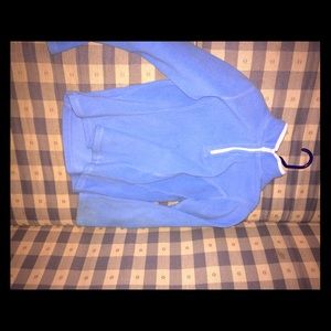 A little zip up blue jacket